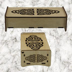 Wooden trinket box with Celtic knot design on a marble background