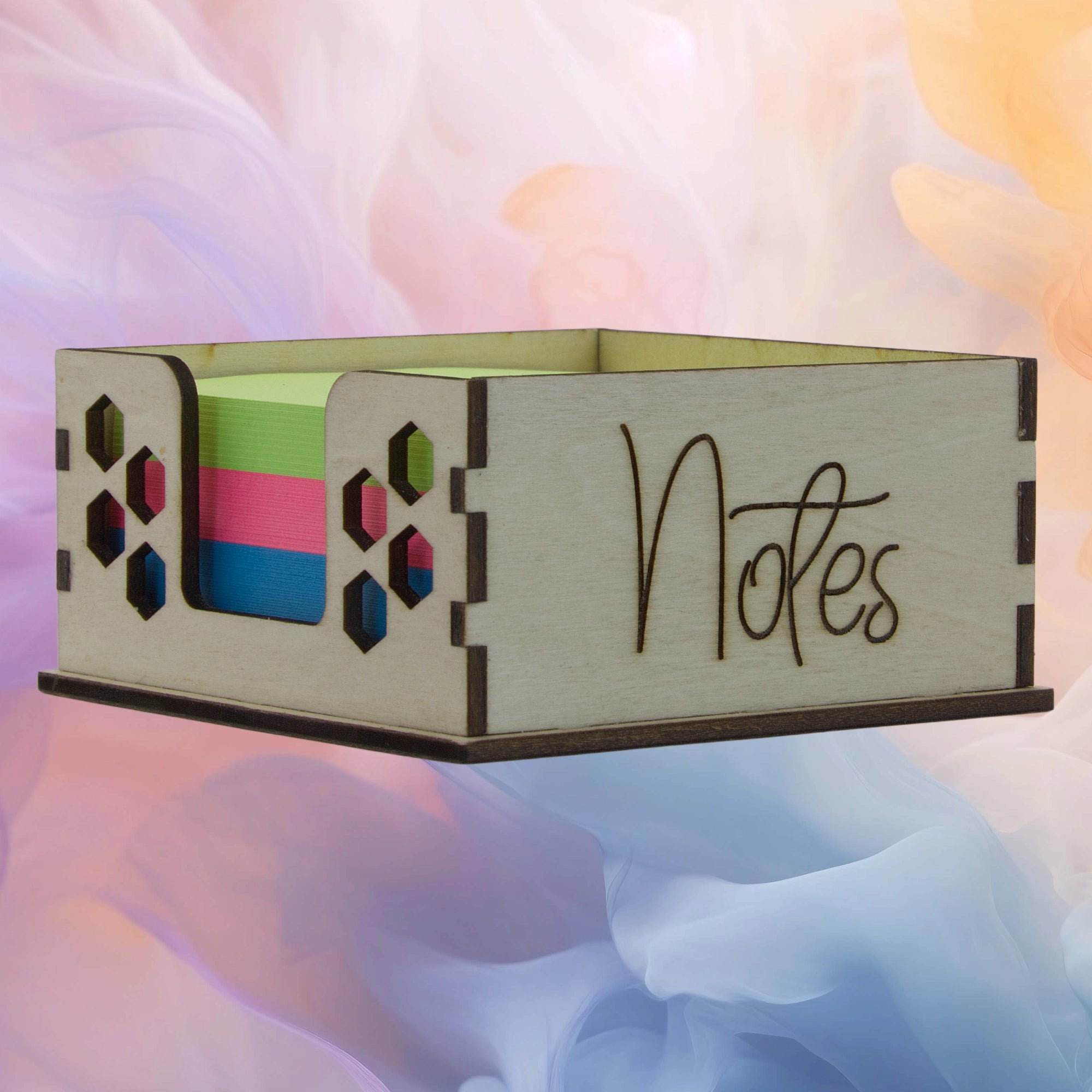 Wooden box with colorful interior and 'Notes' text on a soft, multicolored background