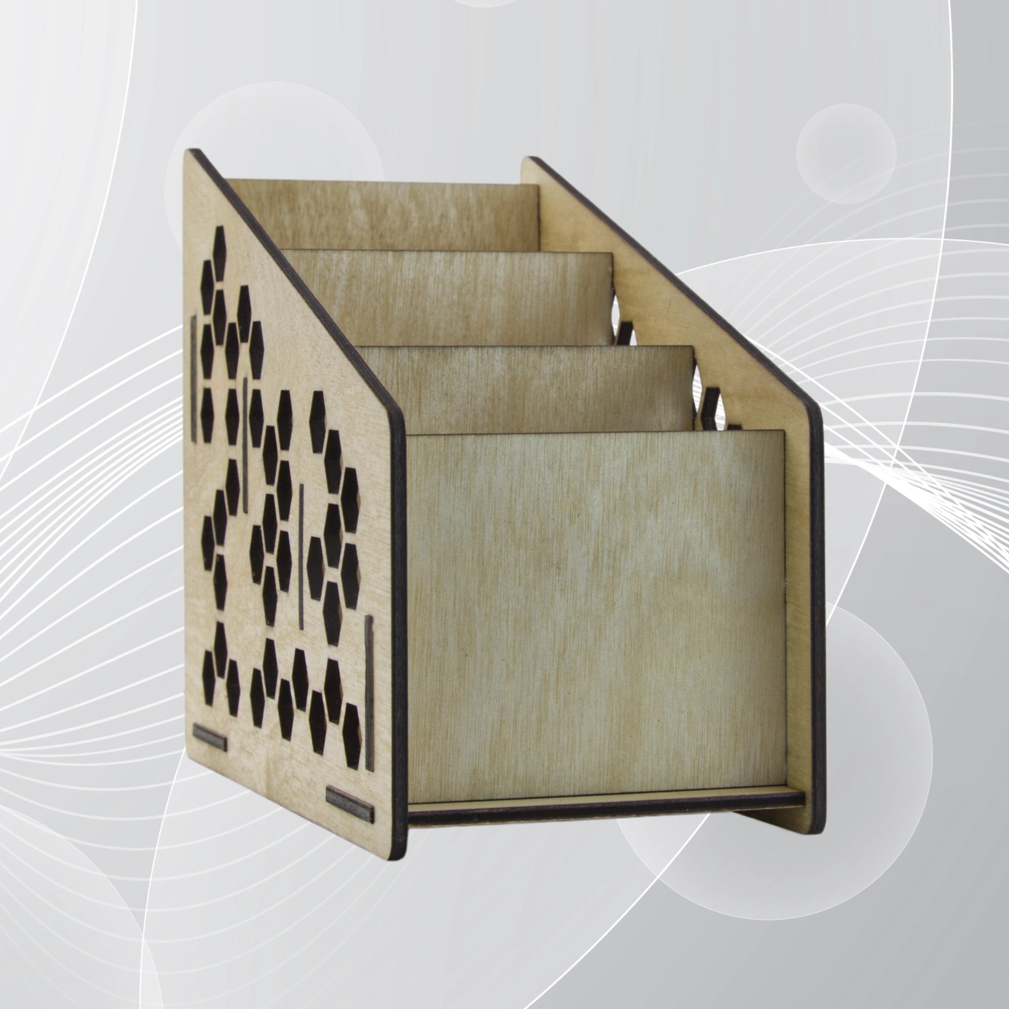 Wooden remote control holder with geometric cutout design on a light gray background