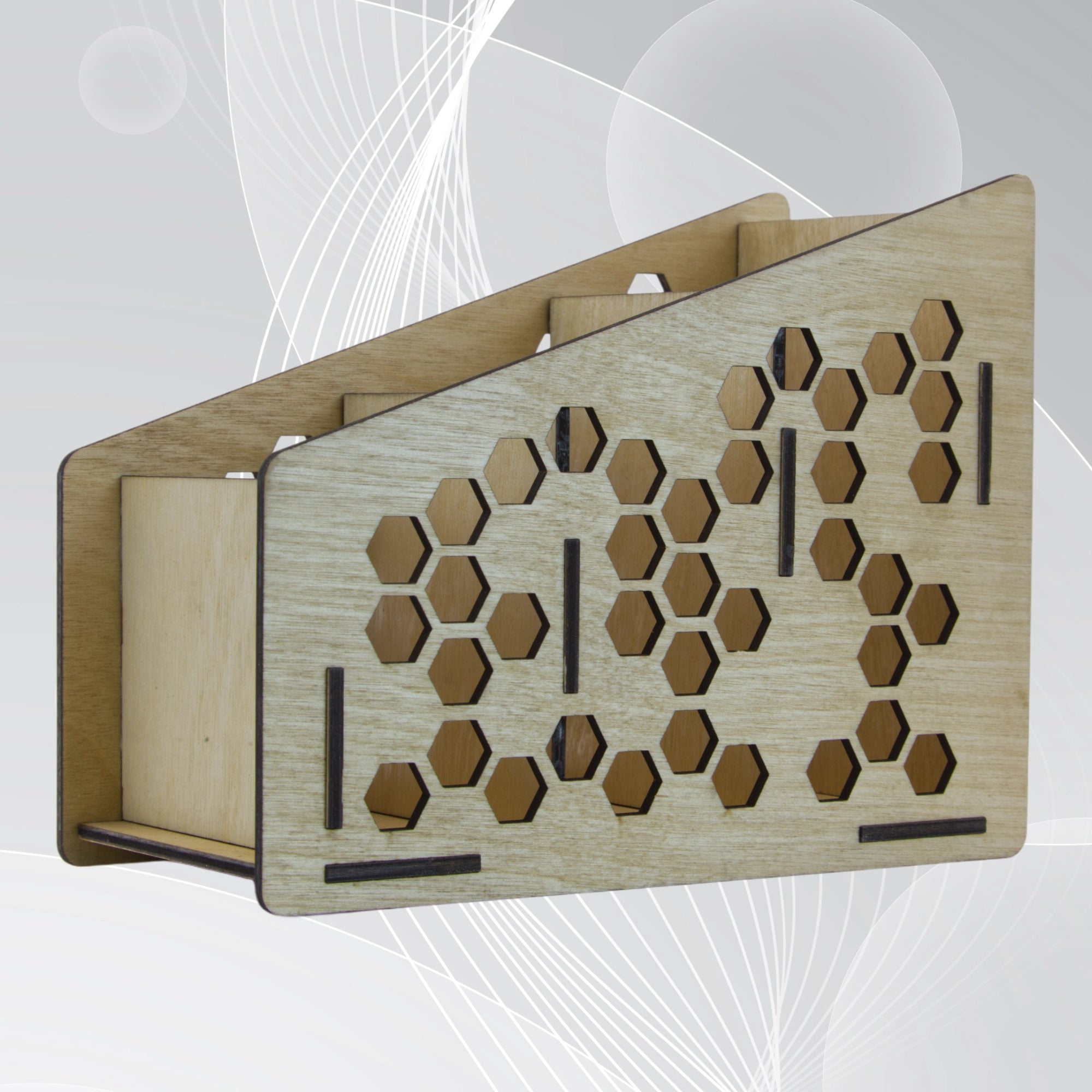 Wooden remote control holder with geometric cutout design on a light gray background