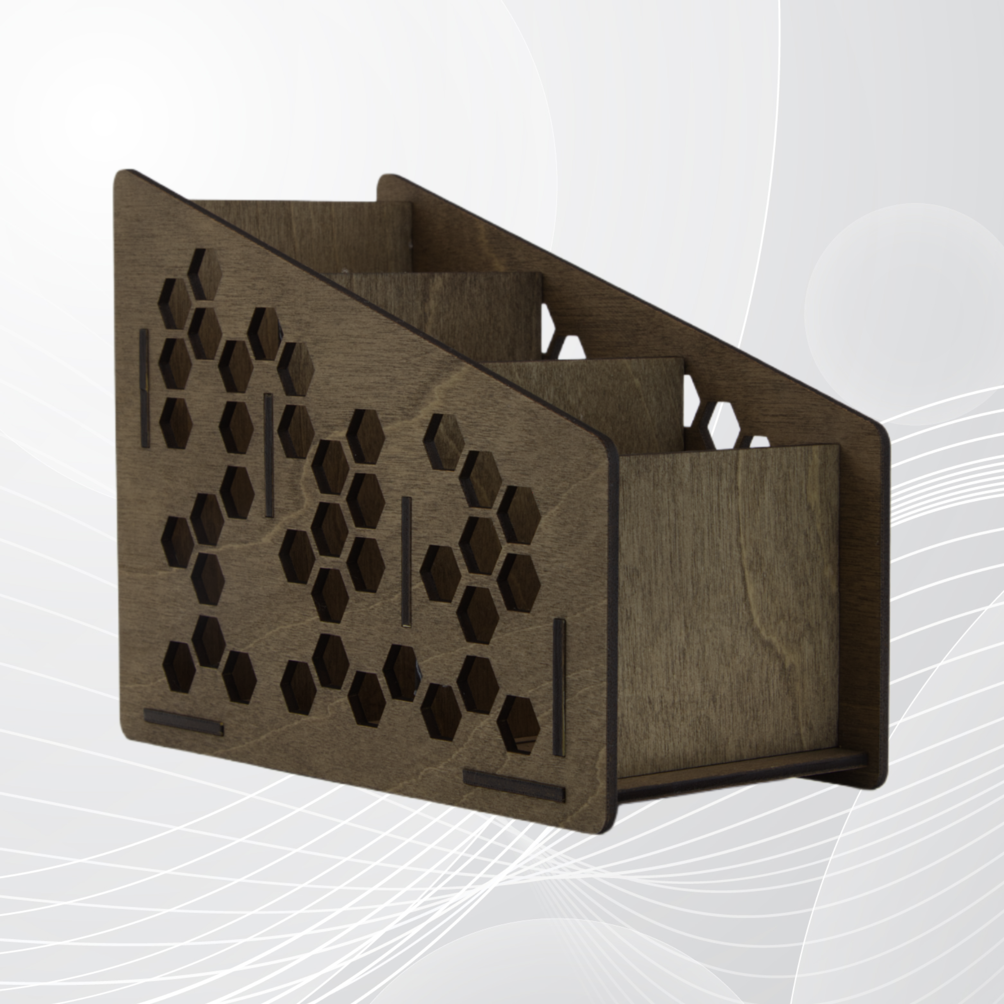 Wooden remote control holder with honeycomb design on a white background