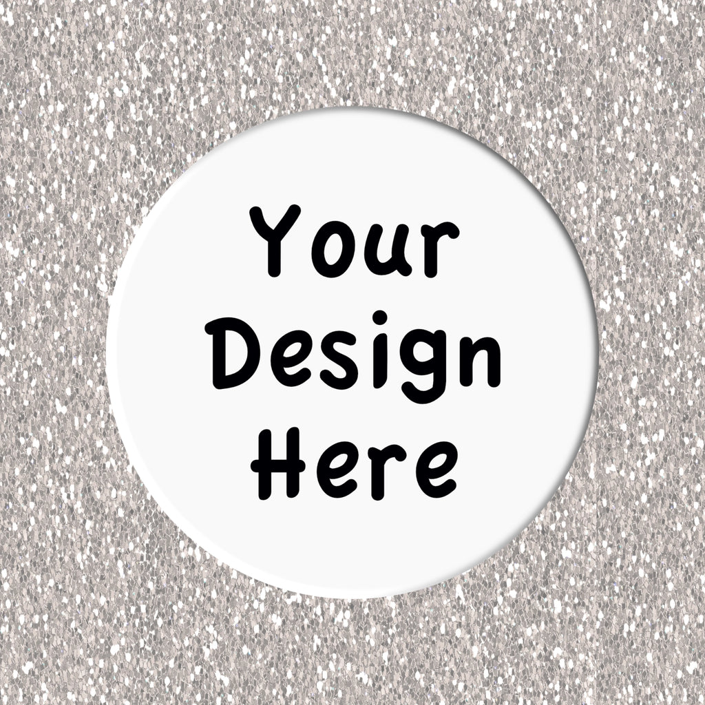 Circular white coaster with 'Your Design Here' text on a silver glittery background