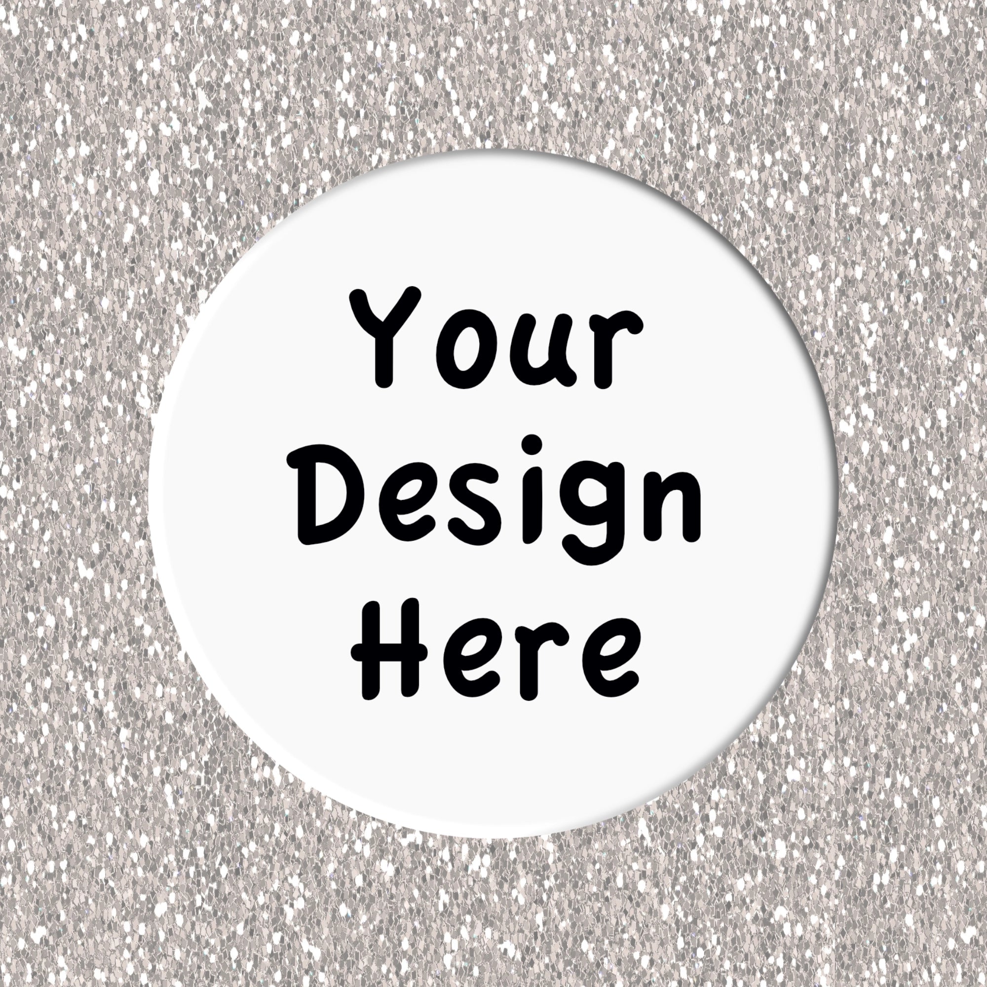 Circular white coaster with 'Your Design Here' text on a silver glittery background