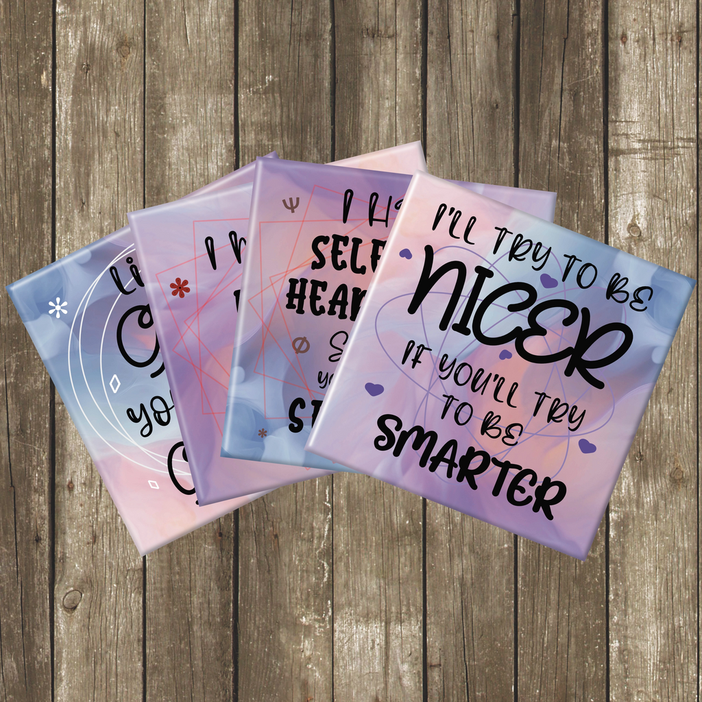 Four coasters with different sarcastic messages on a woodenbackground.